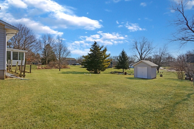 view of yard with a storage shed