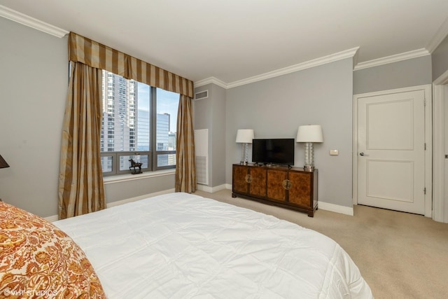 carpeted bedroom featuring crown molding