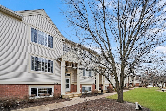 exterior space with a lawn