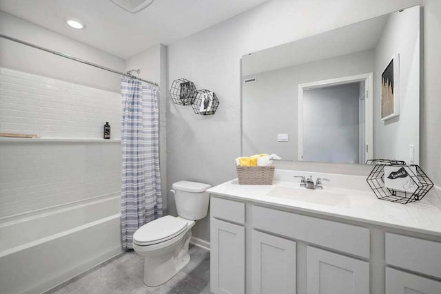 full bathroom with vanity, shower / bath combination with curtain, and toilet