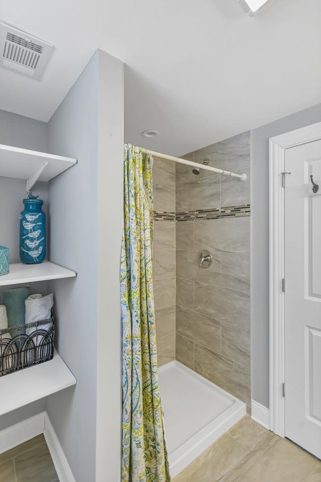 bathroom with curtained shower