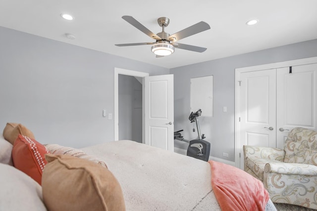 bedroom featuring ceiling fan and a closet