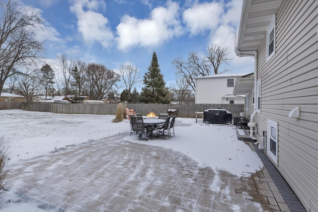 view of yard layered in snow