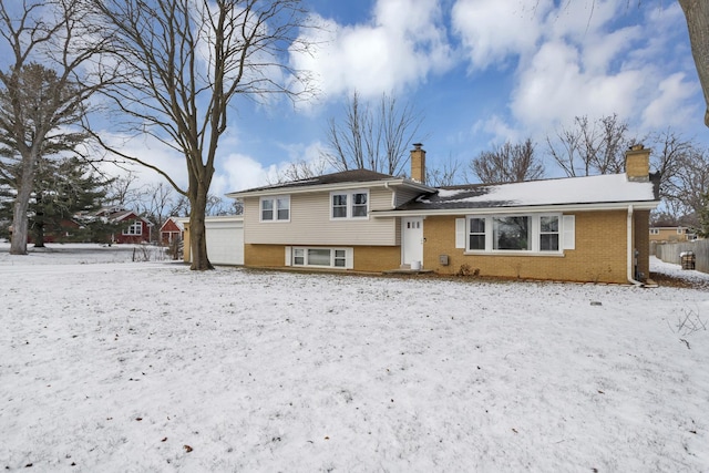 view of snow covered house