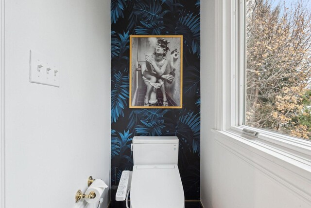 bathroom with tile walls