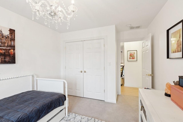 carpeted bedroom with a closet