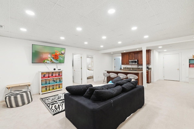 living room featuring light carpet