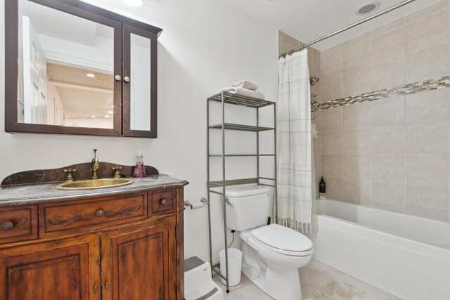 kitchen with a drop ceiling, sink, a baseboard radiator, and dishwasher