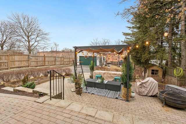 view of yard with a garage and an outdoor structure