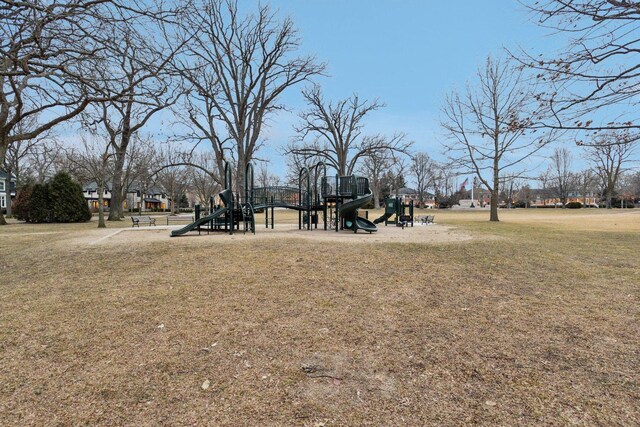 view of playground with a yard