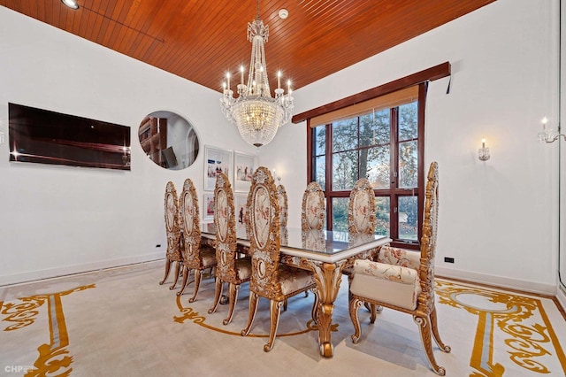 dining space featuring a chandelier and wood ceiling