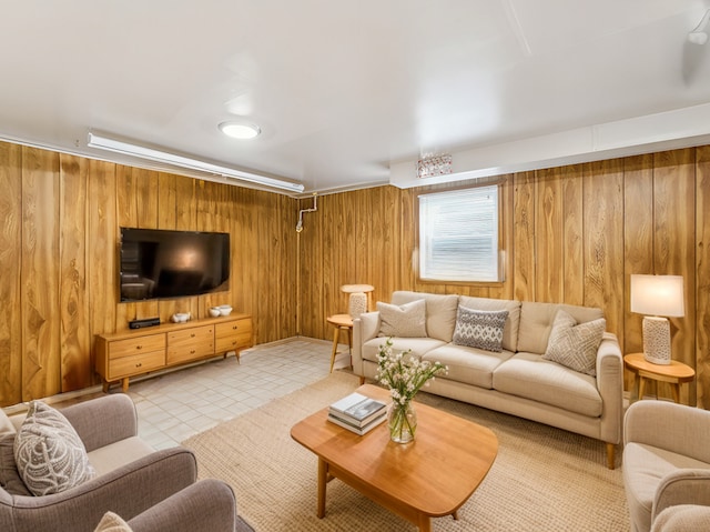 living room featuring wood walls