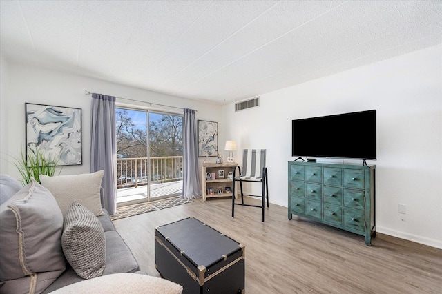 living room with wood-type flooring