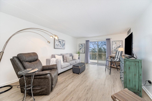 living room featuring light hardwood / wood-style floors