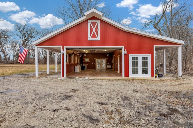 view of outbuilding featuring french doors