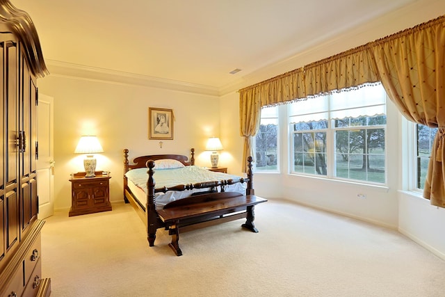 carpeted bedroom featuring ornamental molding