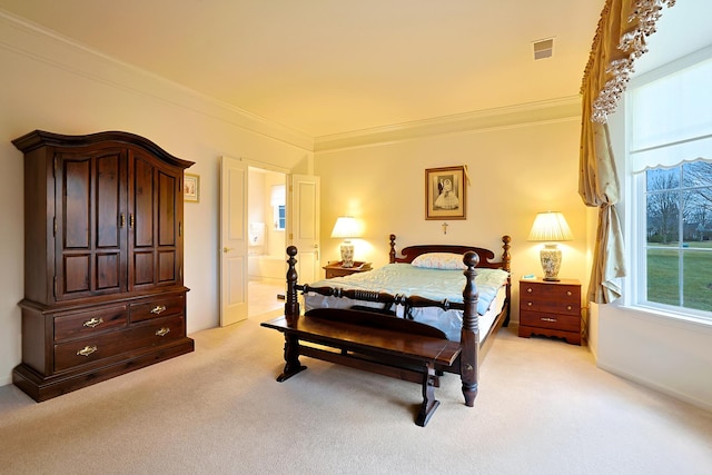 bedroom featuring crown molding and light colored carpet