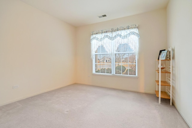 unfurnished room featuring carpet floors