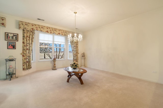 dining area featuring crown molding, carpet floors, and an inviting chandelier