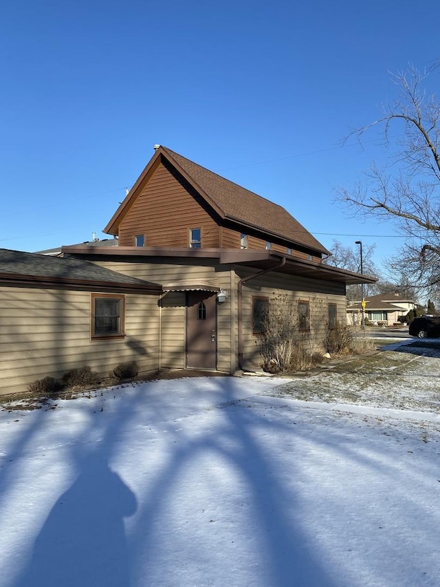 view of snow covered property