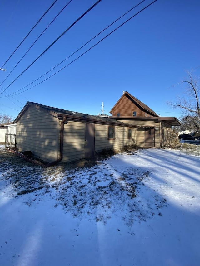 view of snow covered property