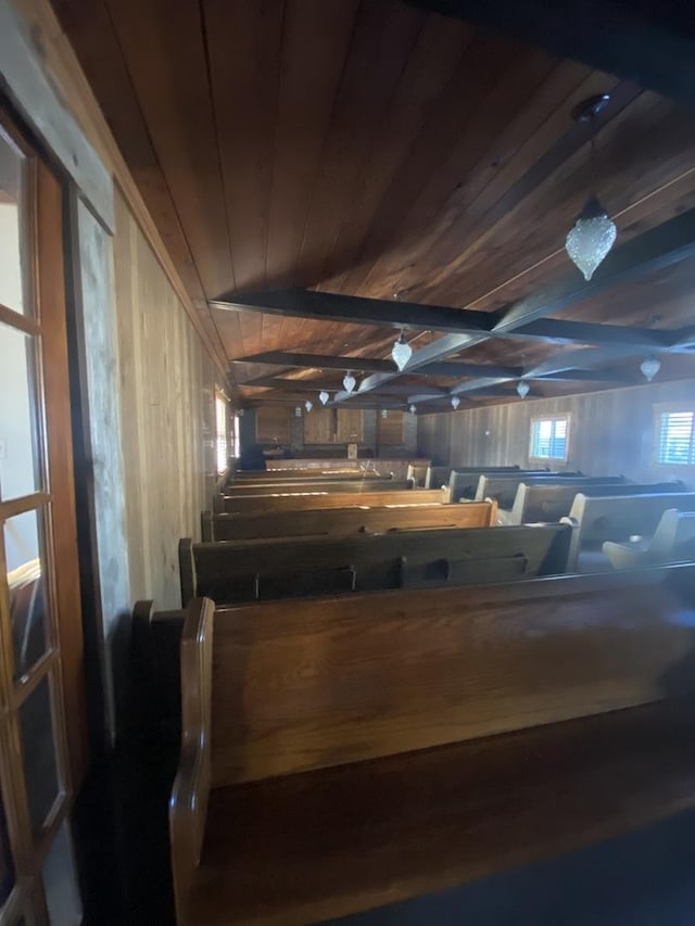 miscellaneous room featuring wood ceiling and wood walls