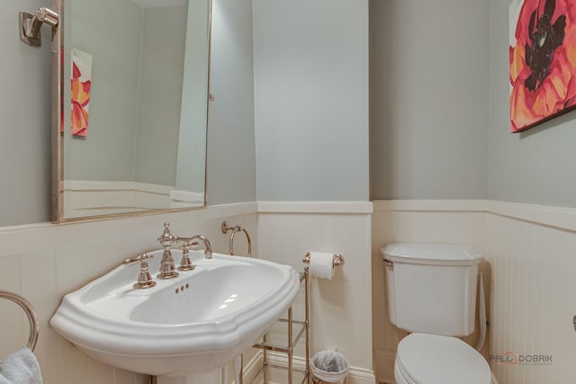 bathroom with sink and toilet