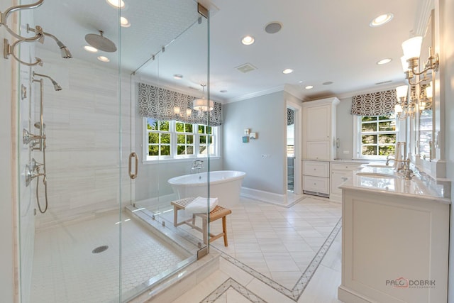 bathroom with a healthy amount of sunlight, vanity, plus walk in shower, and tile patterned floors