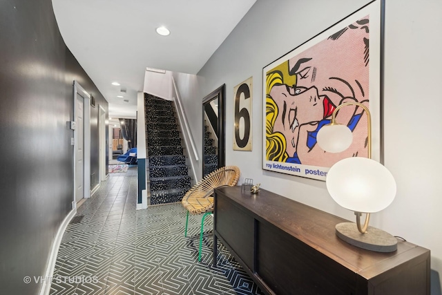 hallway featuring tile patterned flooring