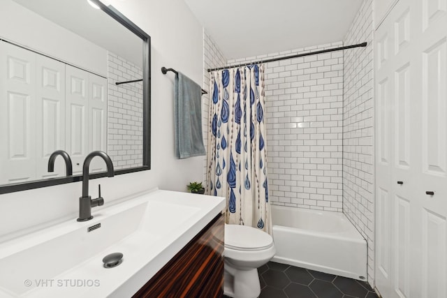 full bathroom with shower / bath combination with curtain, vanity, toilet, and tile patterned flooring