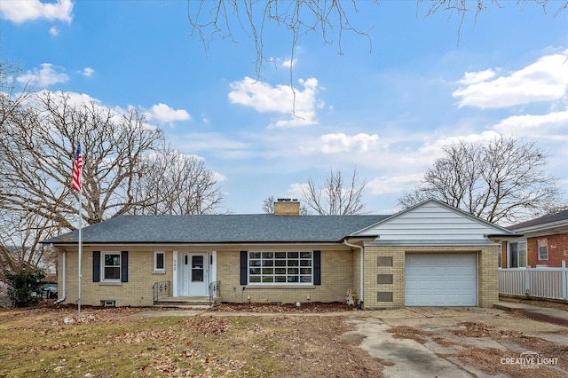 ranch-style home with a garage