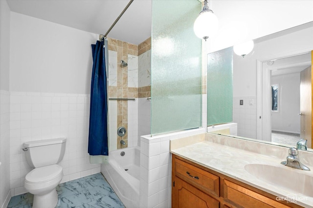 full bathroom with shower / bathtub combination with curtain, vanity, toilet, and tile walls