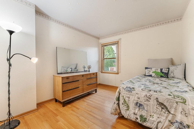 bedroom with light hardwood / wood-style flooring