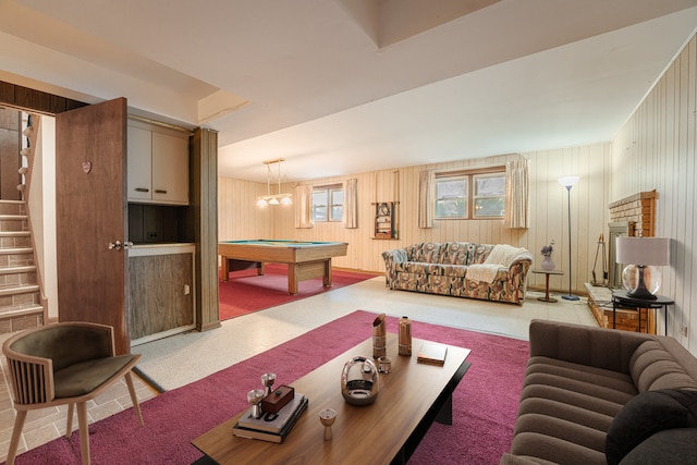 living room with wooden walls and billiards