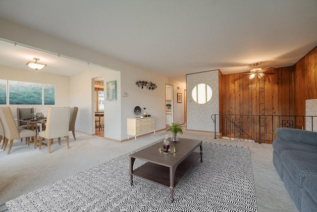 living room with wood walls