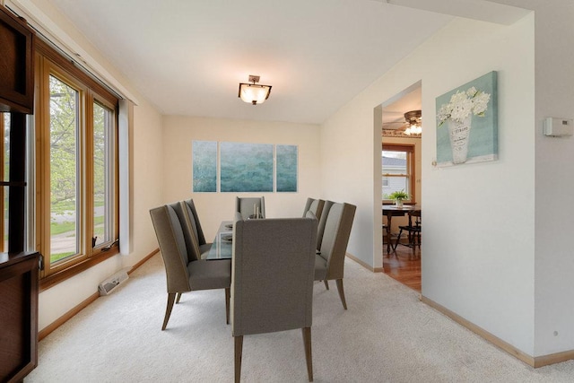 view of carpeted dining room