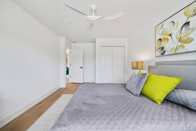 4932 Brummel St, Skokie, IL 60077 - bedroom featuring wood finished floors, a closet, and ceiling fan