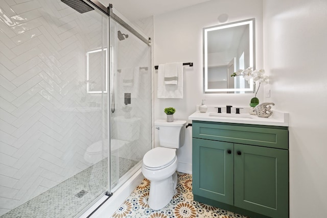 4932 Brummel St, Skokie, IL 60077 - bathroom featuring vanity, a shower stall, and tile patterned floors