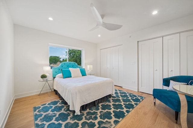 4932 Brummel St, Skokie, IL 60077 - bedroom featuring two closets, light wood-style floors, recessed lighting, and a ceiling fan