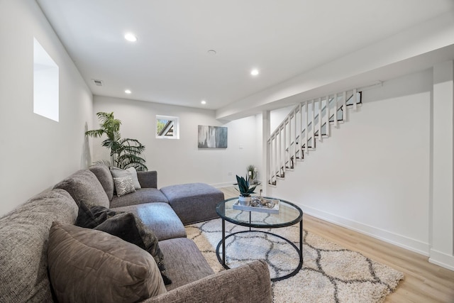 4932 Brummel St, Skokie, IL 60077 - living area with light wood-style floors, stairway, and recessed lighting