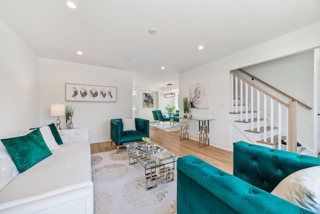 4932 Brummel St, Skokie, IL 60077 - living area featuring wood finished floors, stairway, and recessed lighting