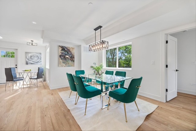 4932 Brummel St, Skokie, IL 60077 - dining area with light wood-style floors and baseboards