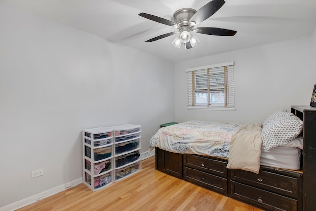 bedroom featuring ceiling fan and light hardwood / wood-style floors