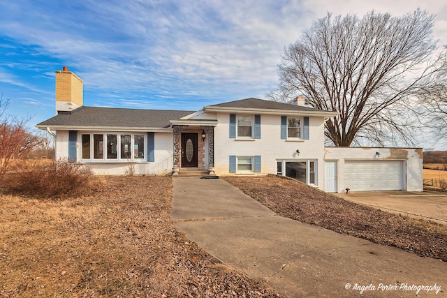 tri-level home featuring a garage