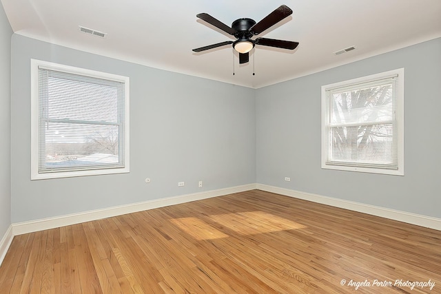 unfurnished room featuring ceiling fan and light hardwood / wood-style flooring