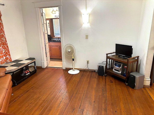 miscellaneous room featuring wood-type flooring