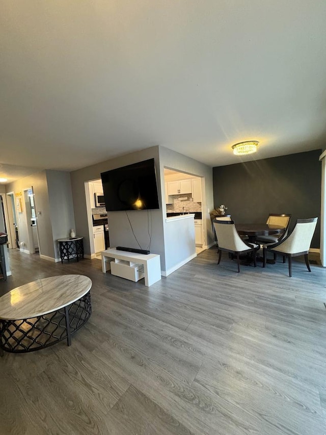 dining space with light wood-type flooring