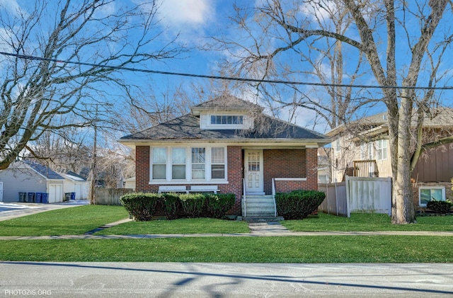 bungalow with a front lawn