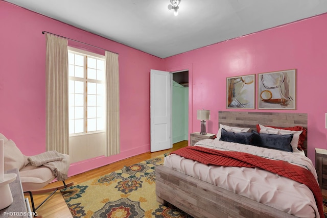 bedroom featuring hardwood / wood-style flooring