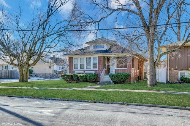 bungalow with a front lawn